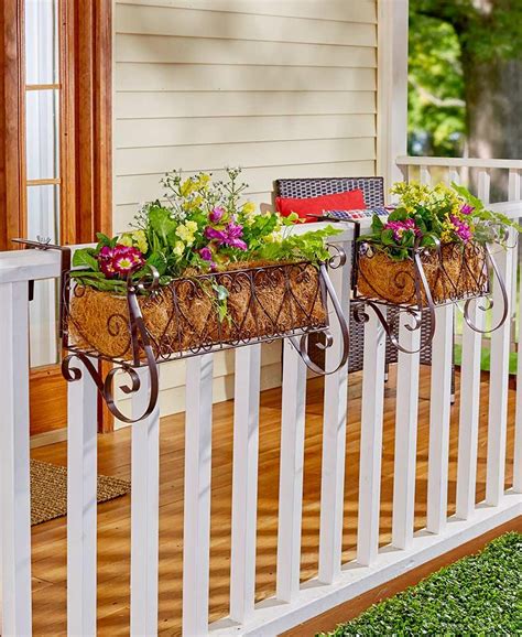 vlack planter boxes haning off a metal rail|deck rail planters.